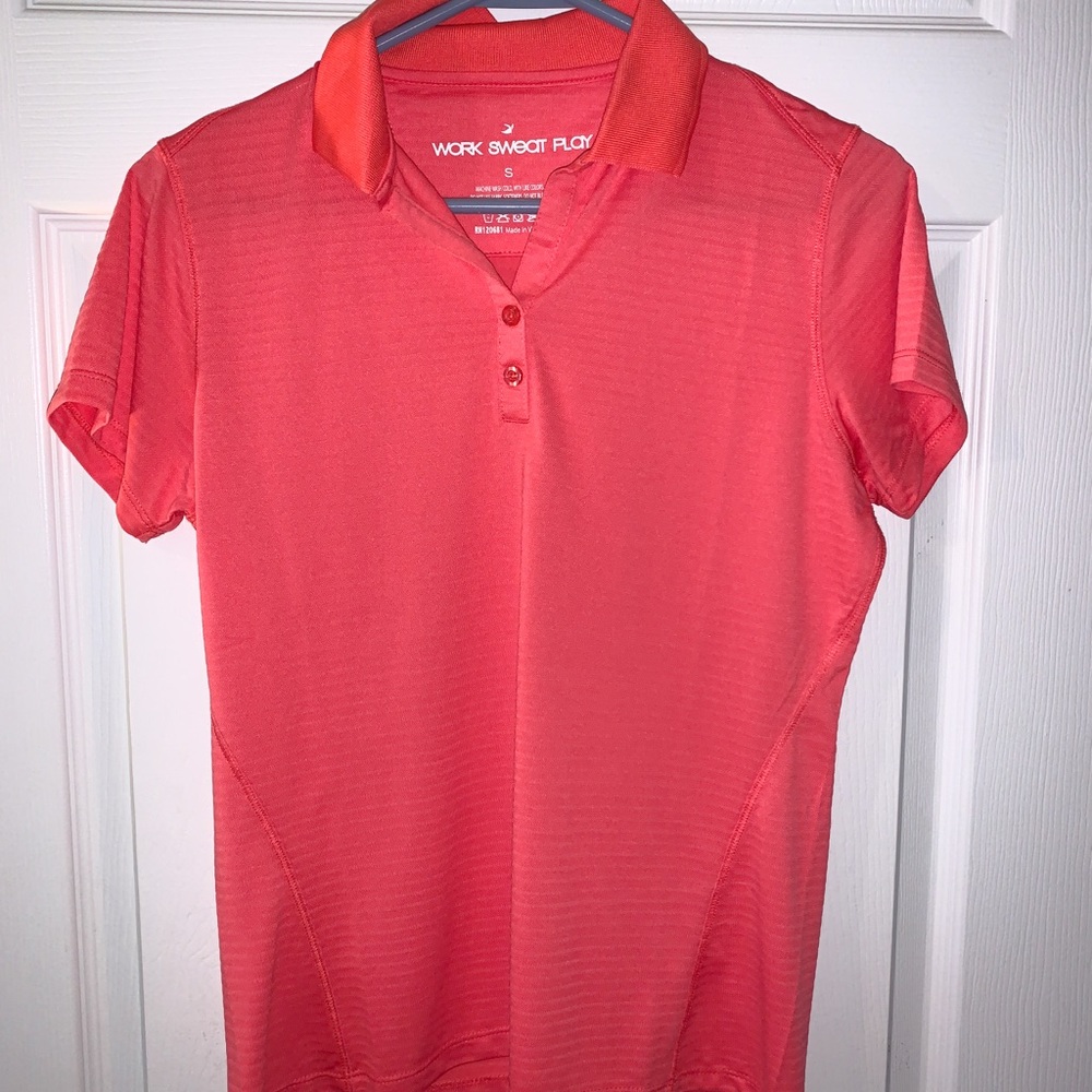 Women’s pink collared athletic shirt. Size small.